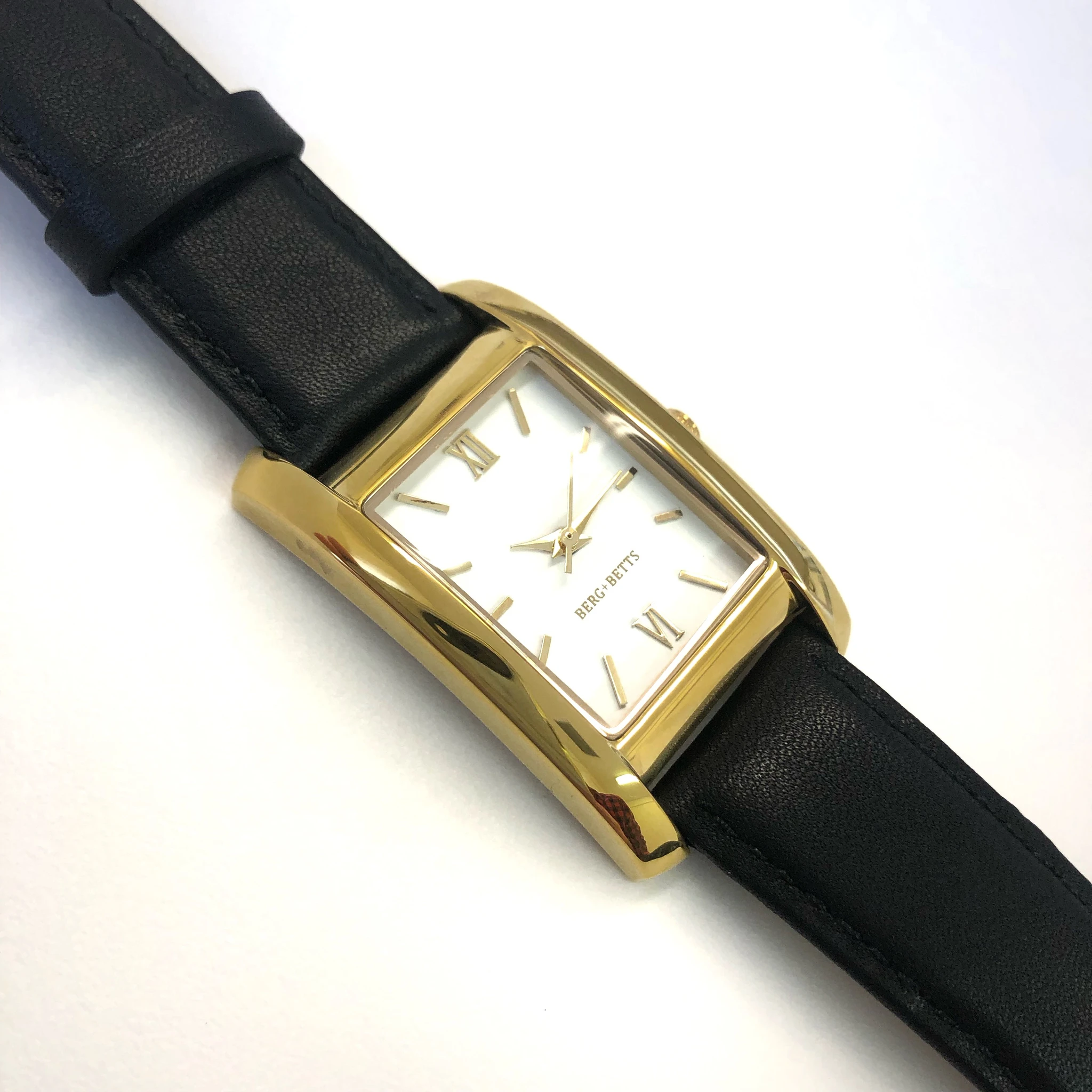 BERG+BETTS | Gold Rectangular minimalistic watch with black band