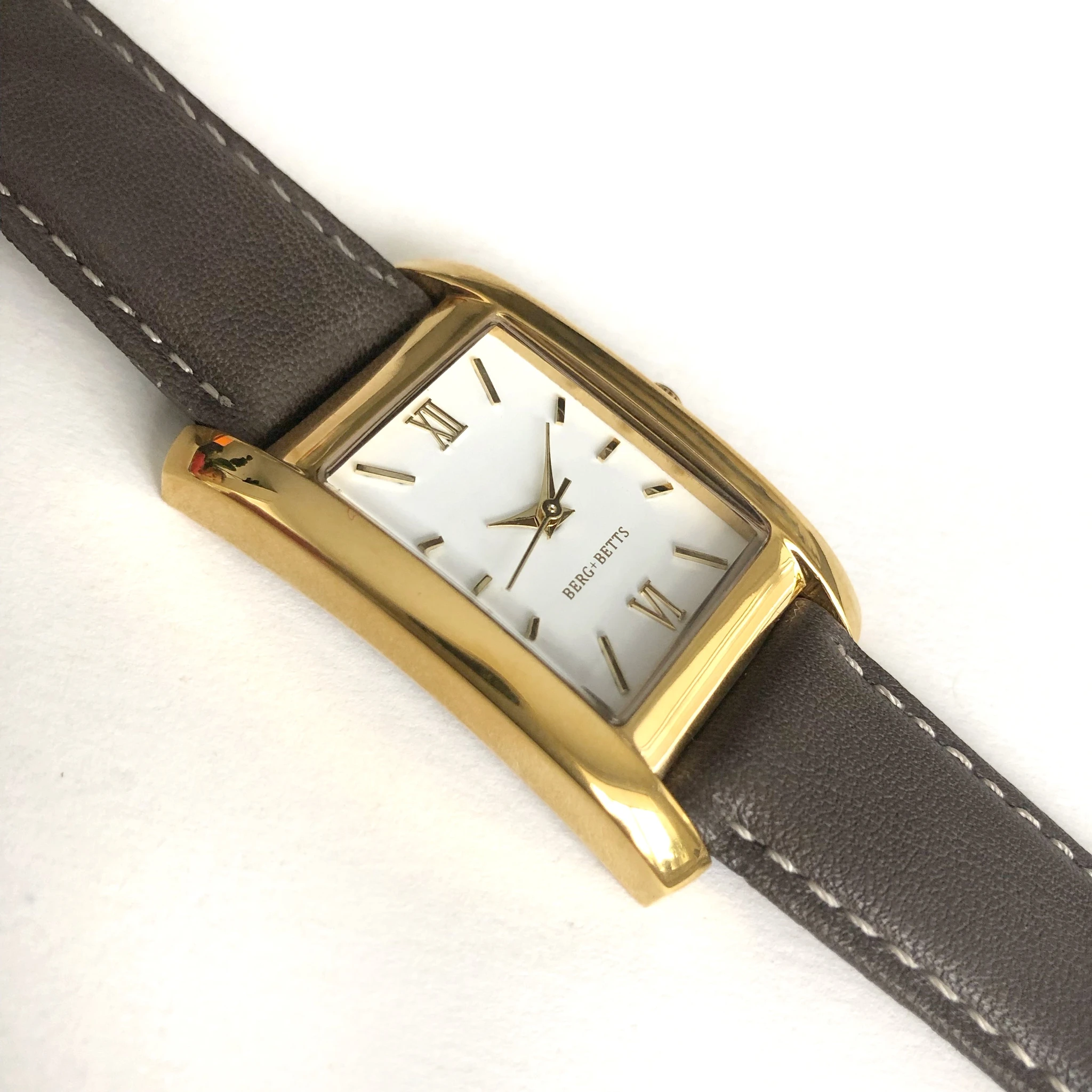 Rectangular Gold watch with sustainable brown strap  