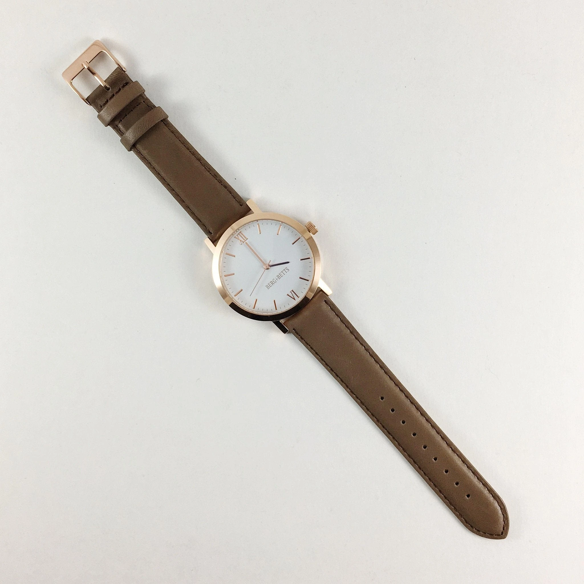 Minimalistic classic rose gold timepiece designed for your sustainable capsule wardrobe