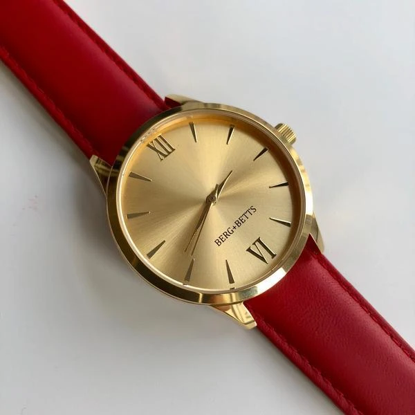 BERG+BETTS Gold watch sustainably made with recycled red leather strap